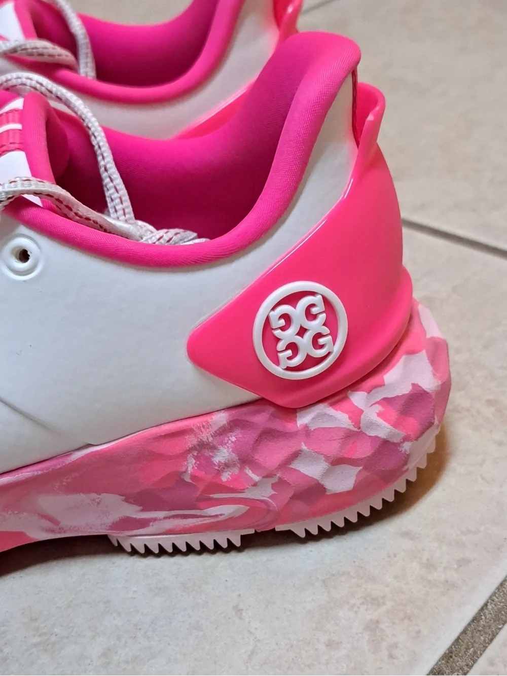 G/FORE Women's MG4+ golf shoes in the Snow/Knockout Pink Colorway
